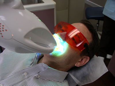 Patient under the zoom whitening light. 
